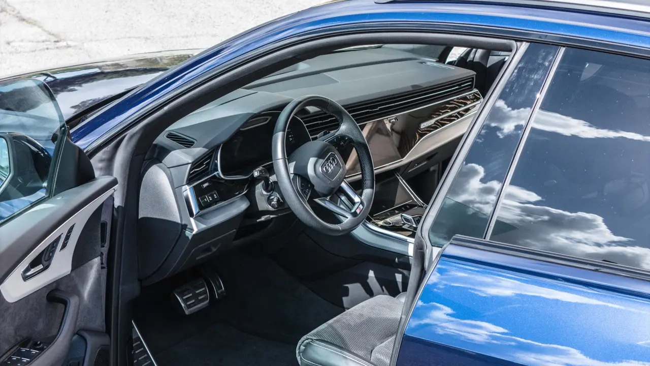 Audi Q8 55 TFSI 2022, interior — Sports Car Rental Germany, Germany. Effortless comfort for long touring days with family