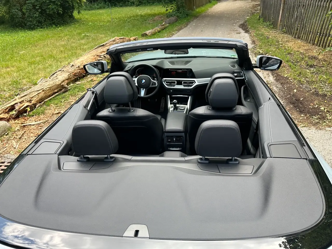 BMW 430i Cabrio 2023, rear view — Sports Car Rental Germany, Germany. Top down for sunlit backroads between meetings