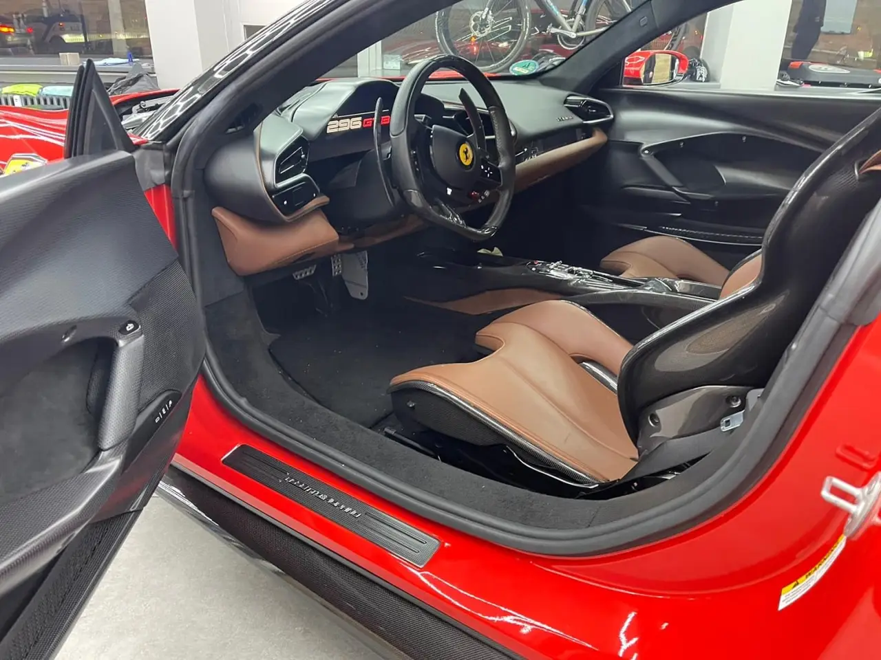 Ferrari 296 GTB 2023, Außenansicht — Sports Car Rental Germany, Germany. 830 PS für kurvige Alpenpässe und leise Ankünfte
