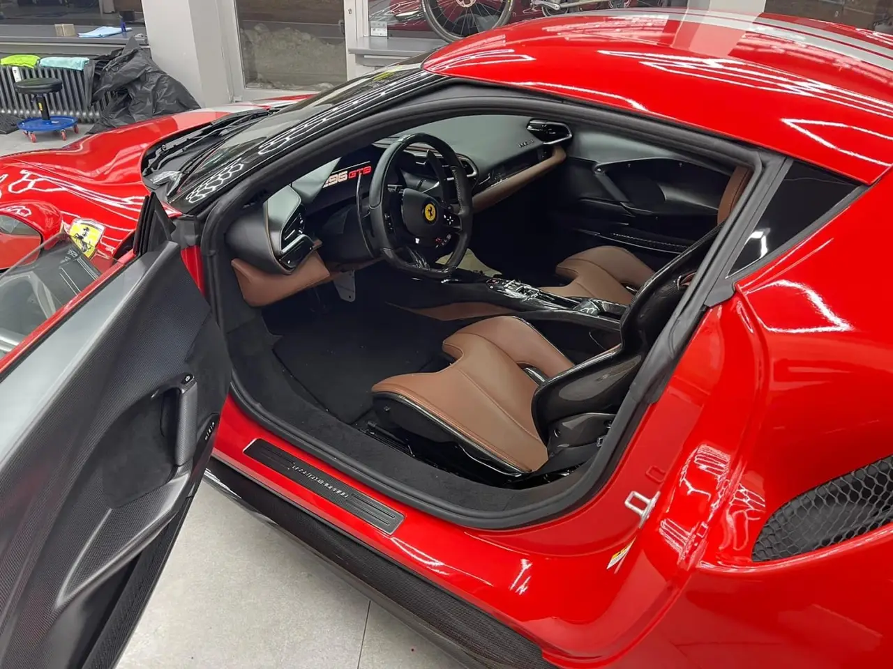Ferrari 296 GTB 2023, Frontansicht — Sports Car Rental Germany, Germany. 830 PS für kurvige Alpenpässe und leise Ankünfte