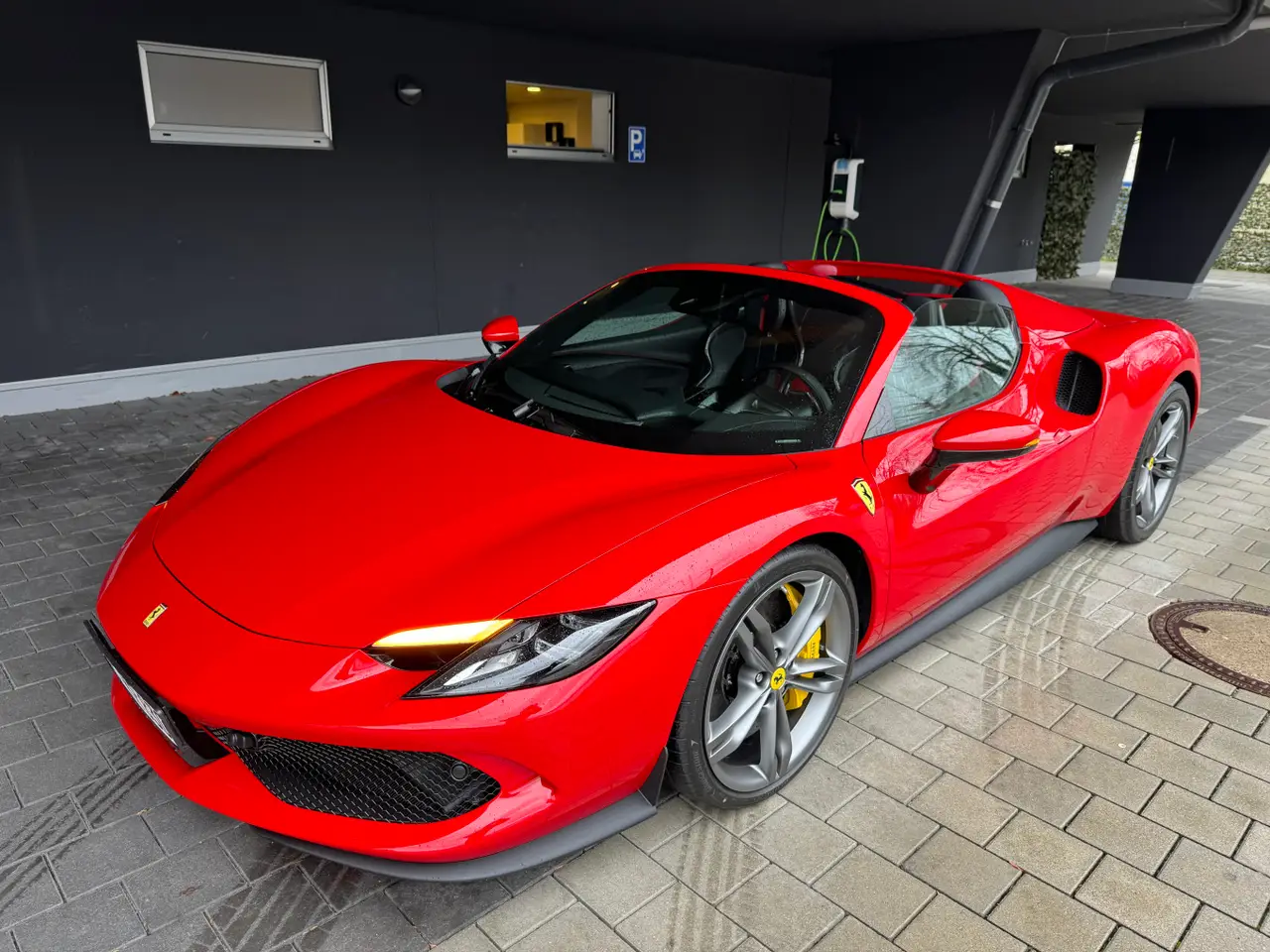 Ferrari 296 GTS Spider 2024, interior — Sports Car Rental Germany, Germany. Open-top hairpins on Alpine passes, engine singing