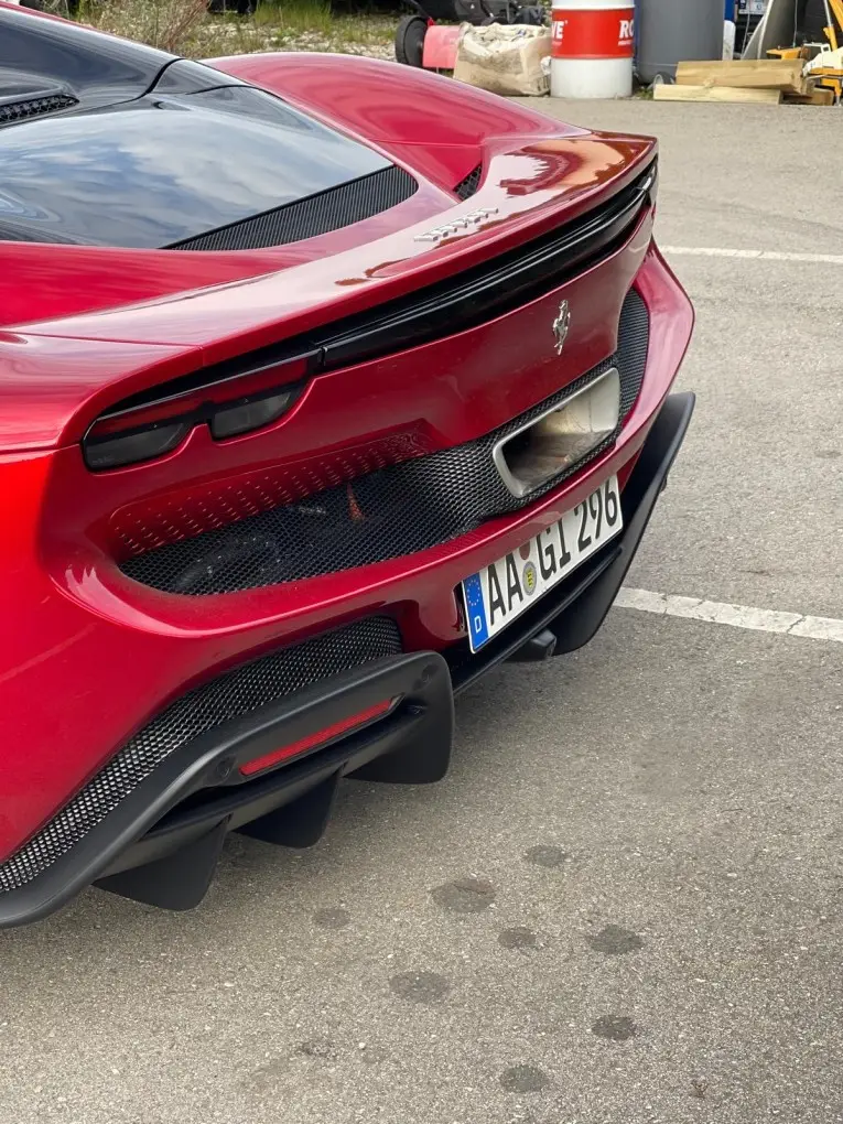 Ferrari 296 GTS Spider 2025, rear view — Sports Car Rental Germany, Germany. Open-top hairpins through the Alps, engine singing