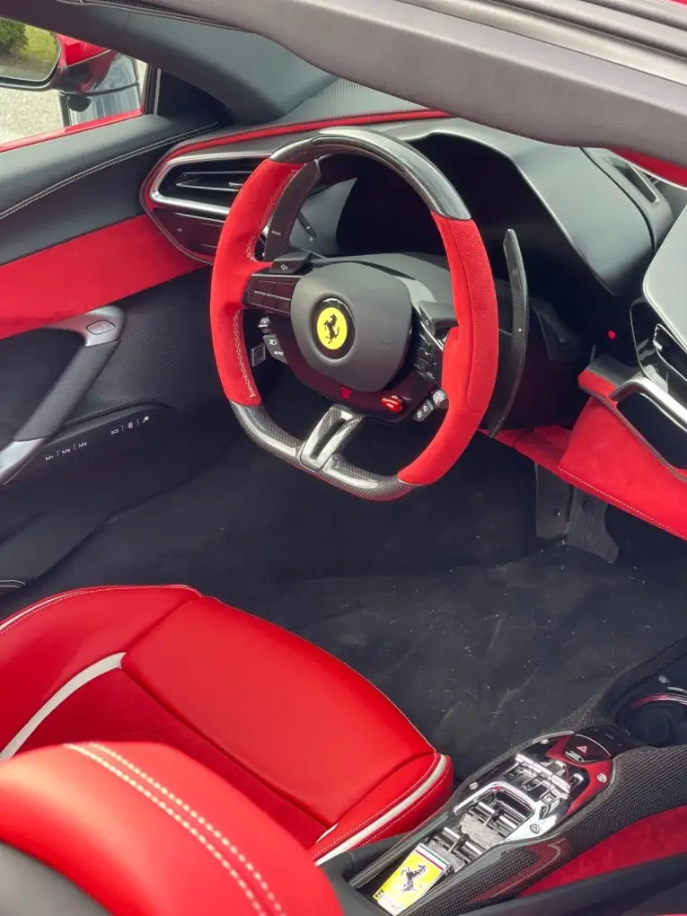 Ferrari 296 GTS Spider 2025, interior — Sports Car Rental Germany, Germany. Open-top hairpins through the Alps, engine singing