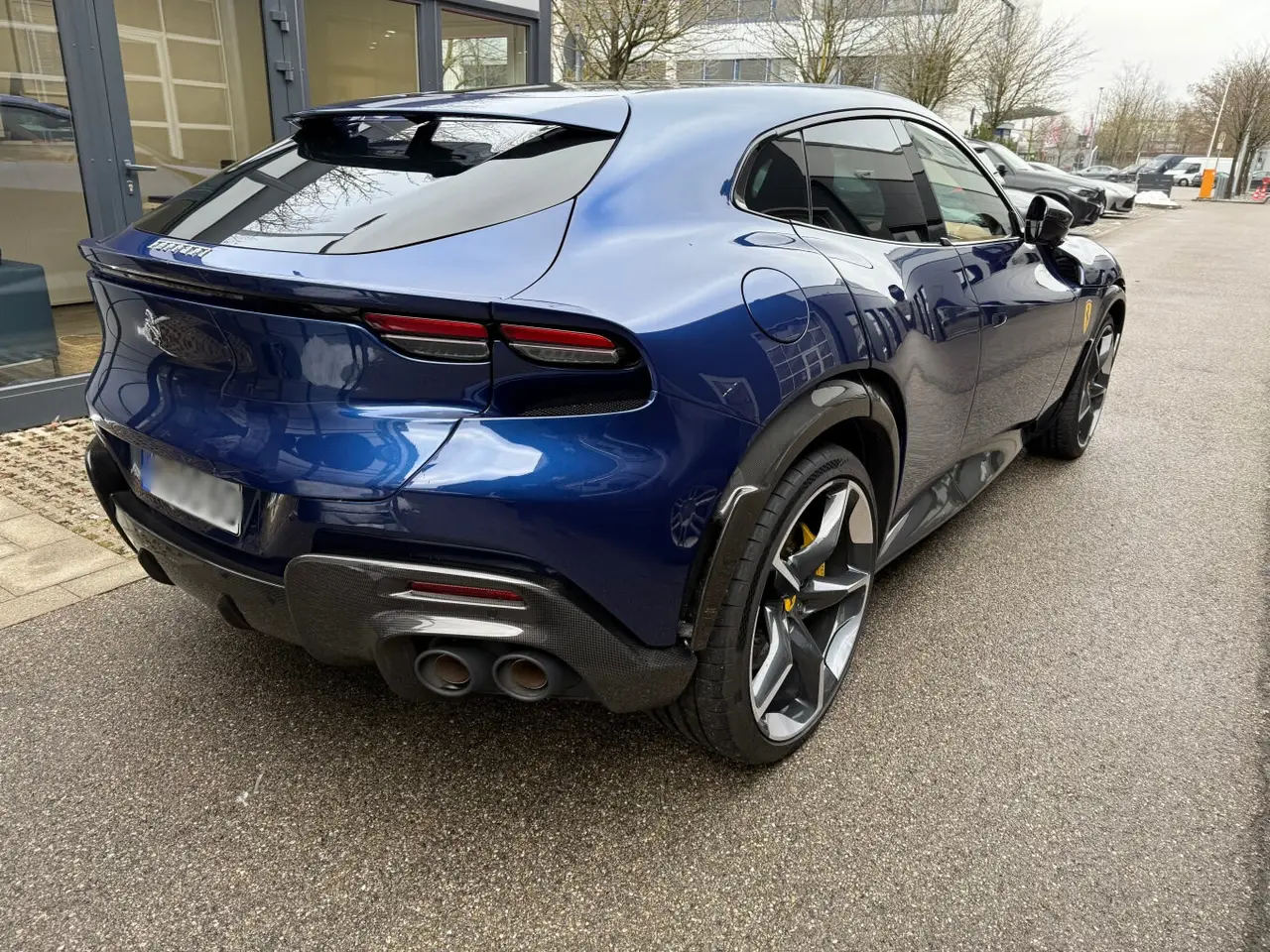 Ferrari Purosangue 2024, exterior — Sports Car Rental Germany, Germany. Four seats, mountain roads, zero compromise on speed
