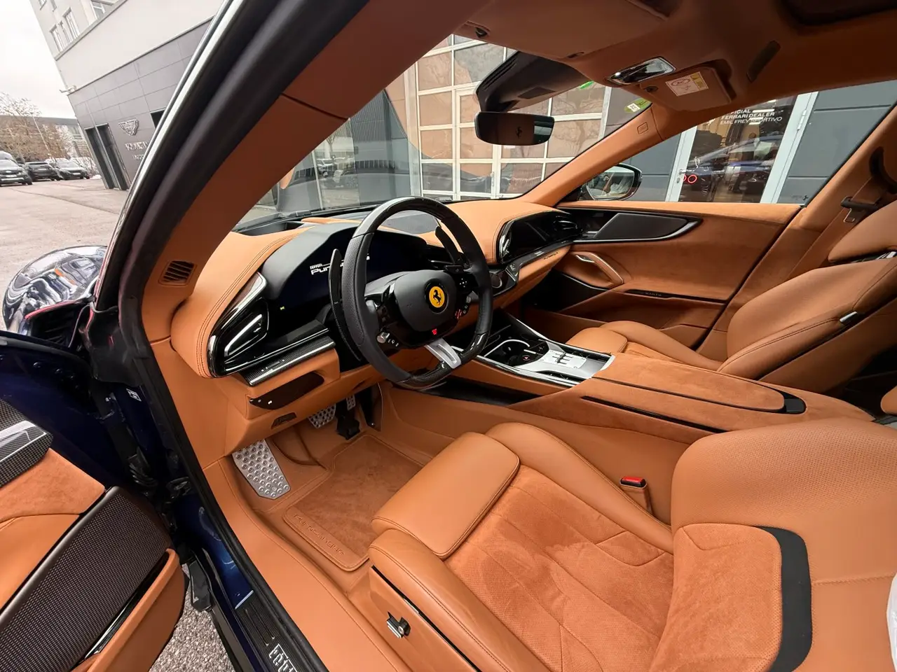 Ferrari Purosangue 2024, rear view — Sports Car Rental Germany, Germany. Four seats, mountain roads, zero compromise on speed