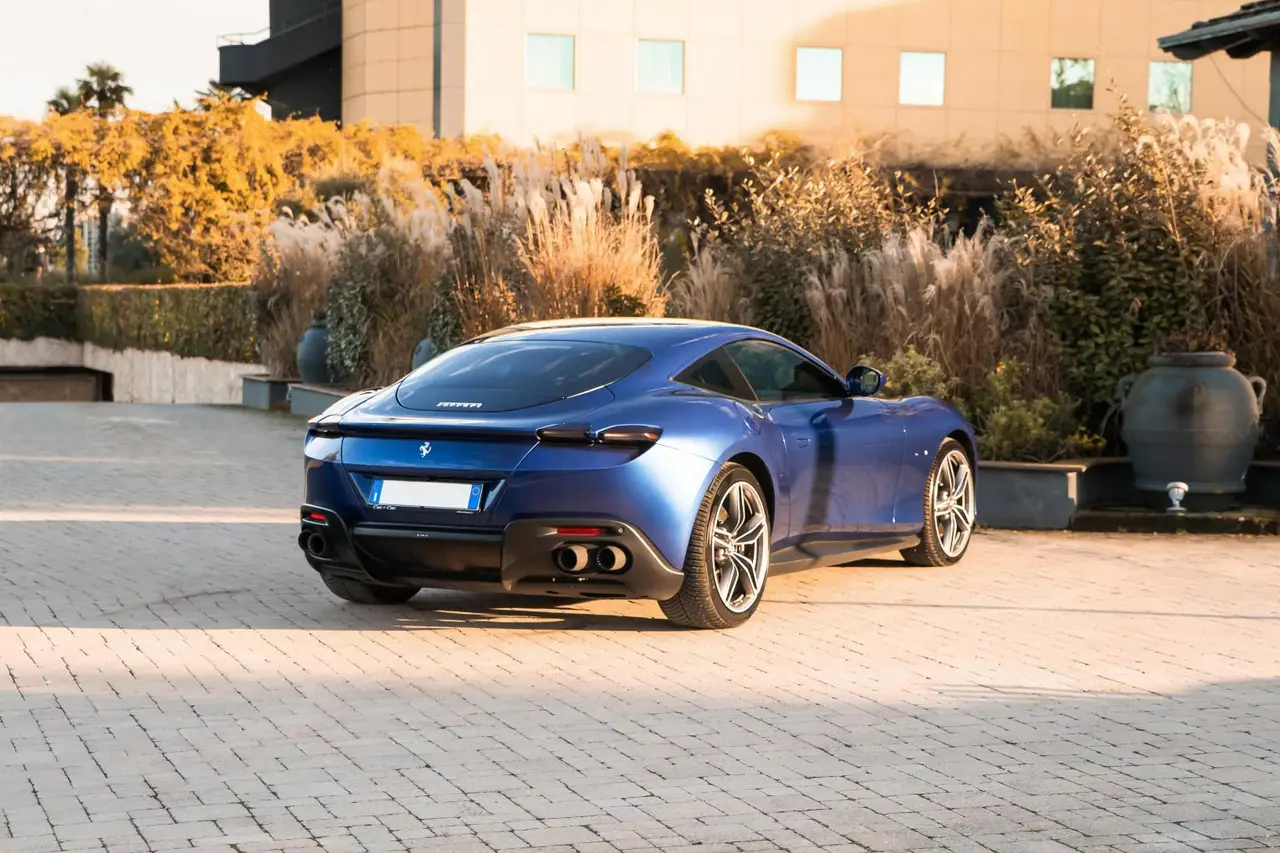 Ferrari Roma 2025, Frontansicht — Sports Car Rental Germany, Germany. Kurvenreiche Passstraßen, sanftes Cabrio-Gleiten am Abend
