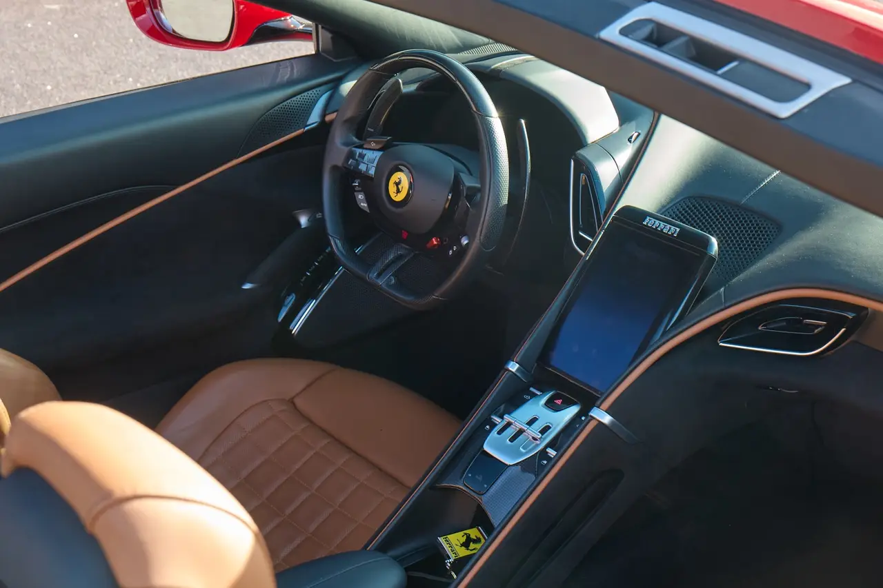 Ferrari Roma Spider 2024, rear view — Sports Car Rental Germany, Germany. Open-top elegance for coastal roads and golden hours