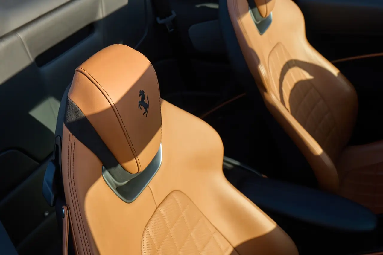 Ferrari Roma Spider 2024, interior — Sports Car Rental Germany, Germany. Open-top elegance for coastal roads and golden hours