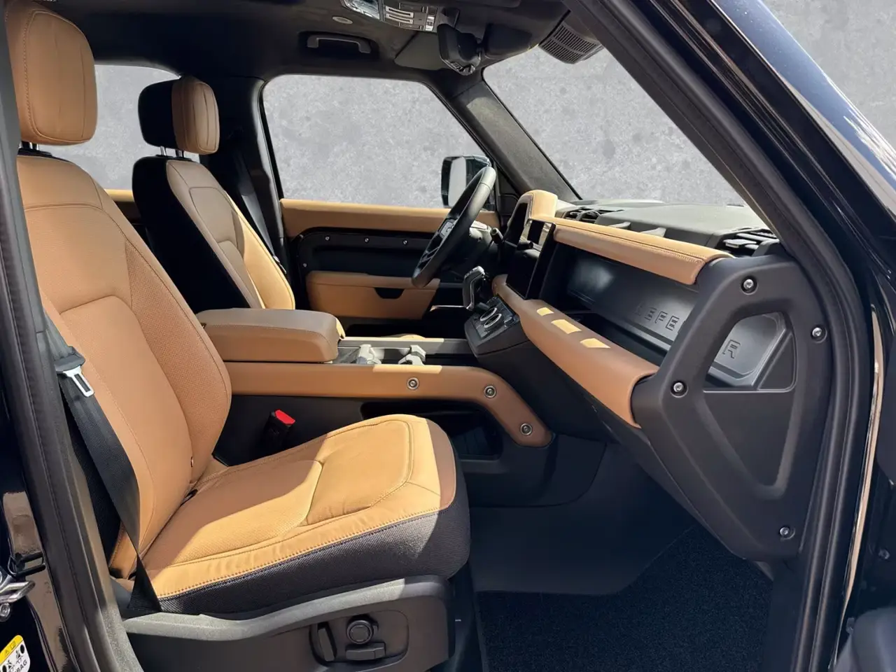 Land Rover Defender 2024, front view — Sports Car Rental Germany, Germany. Built for gravel tracks and Alpine border crossings