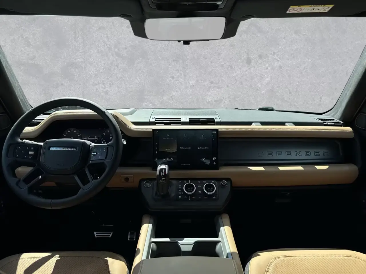 Land Rover Defender 2024, rear view — Sports Car Rental Germany, Germany. Built for gravel tracks and Alpine border crossings