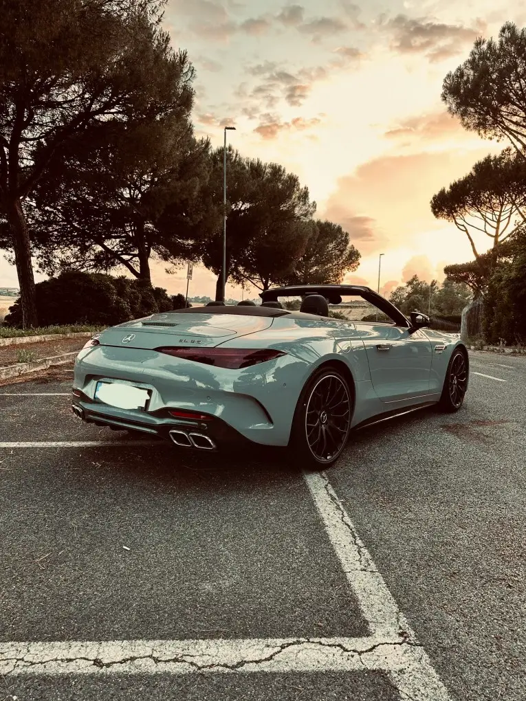 Mercedes Benz SL63 Cabrio 2023, rear view — Sports Car Rental Germany, Germany. Open-top mountain roads, top down, engine singing