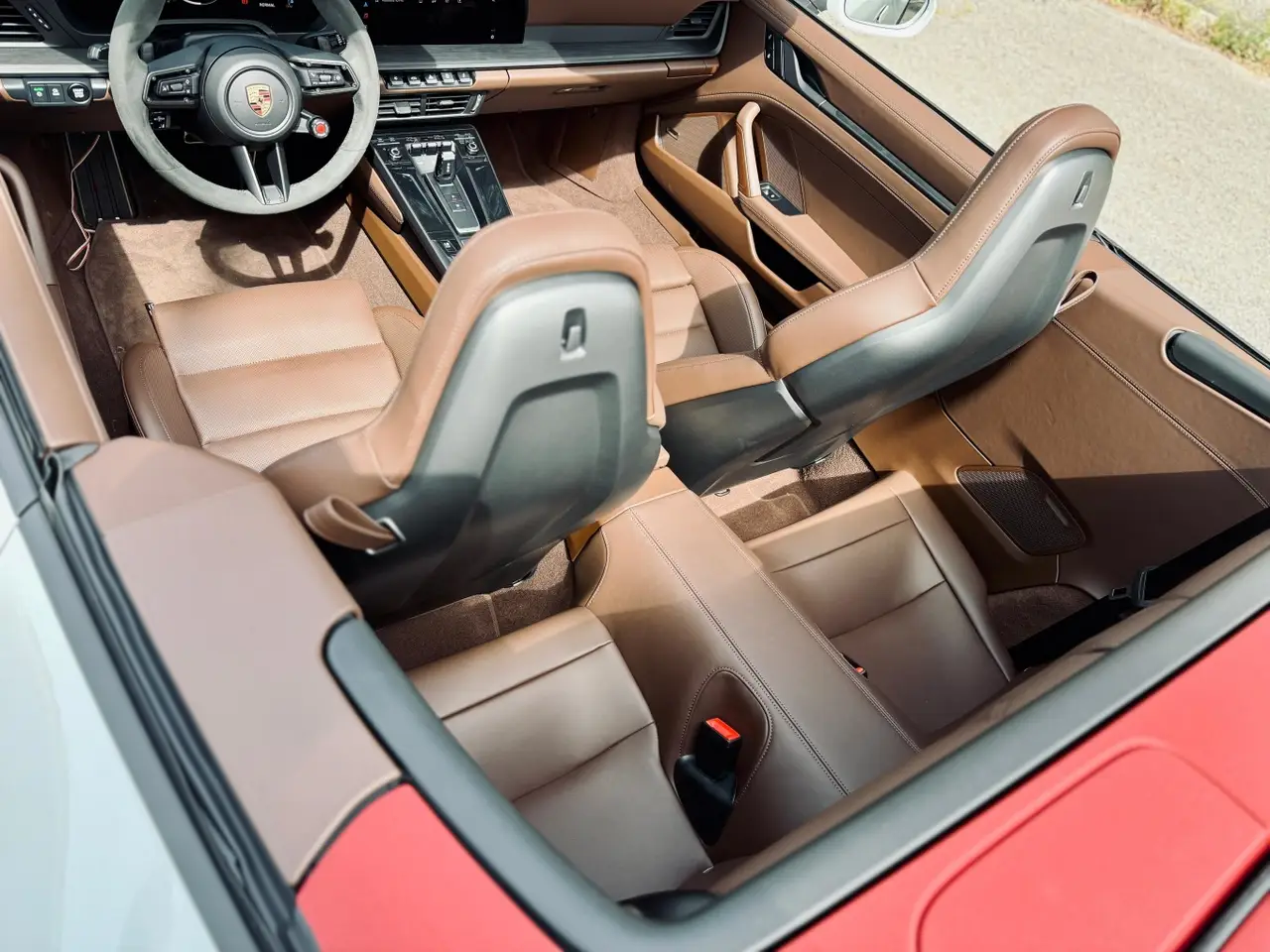 Porsche 992.2 Carrera 4 GTS Cabrio 2025, side profile — Sports Car Rental Germany, Germany. Top down for Alpine passes at golden hour