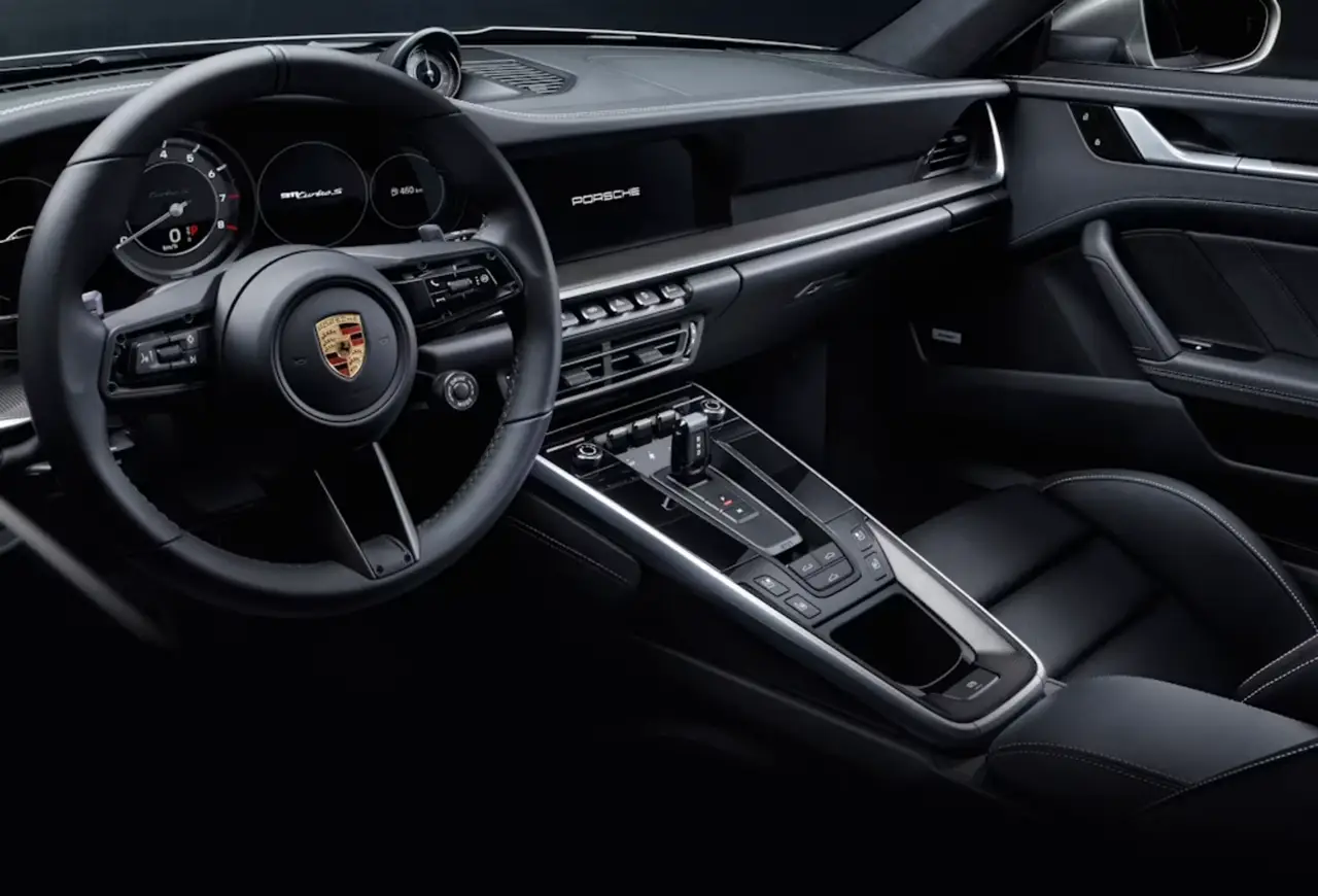 Porsche 992 Carrera 4 GTS Cabrio 2024, exterior — Sports Car Rental Germany, Germany. Top down for winding roads before sunset