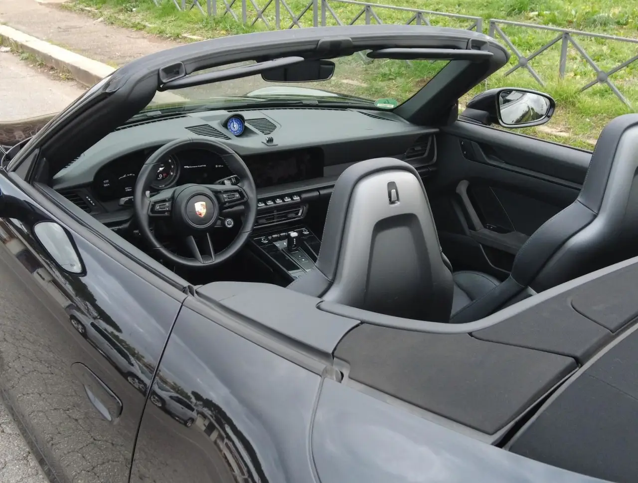 Porsche 992 Carrera 4 GTS Cabrio 2024, interior — Sports Car Rental Germany, Germany. Top down for winding roads before sunset