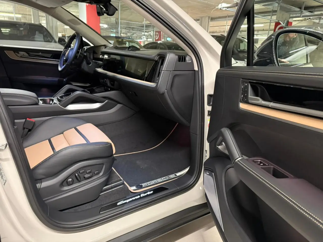 Porsche Cayenne Turbo E-Hybrid Coupé GT 2026, rear view — Sports Car Rental Germany, Germany. Silent power for autobahn dawns and mountain switchbacks